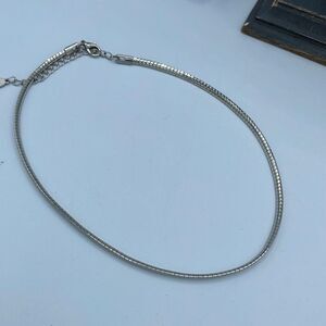 Belle Miss serpentine silver colored choker .